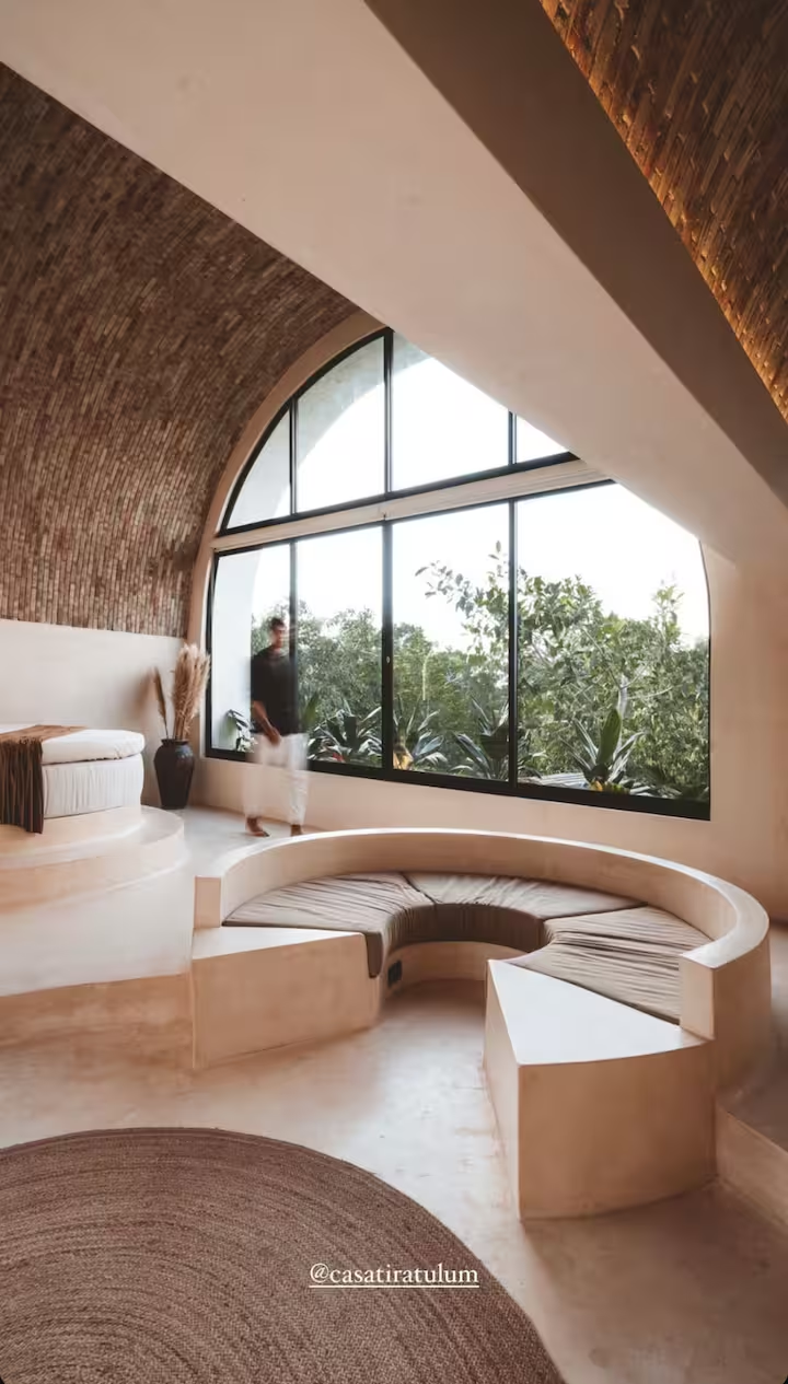 Maya Suite — sunken conversation pit and treetop view